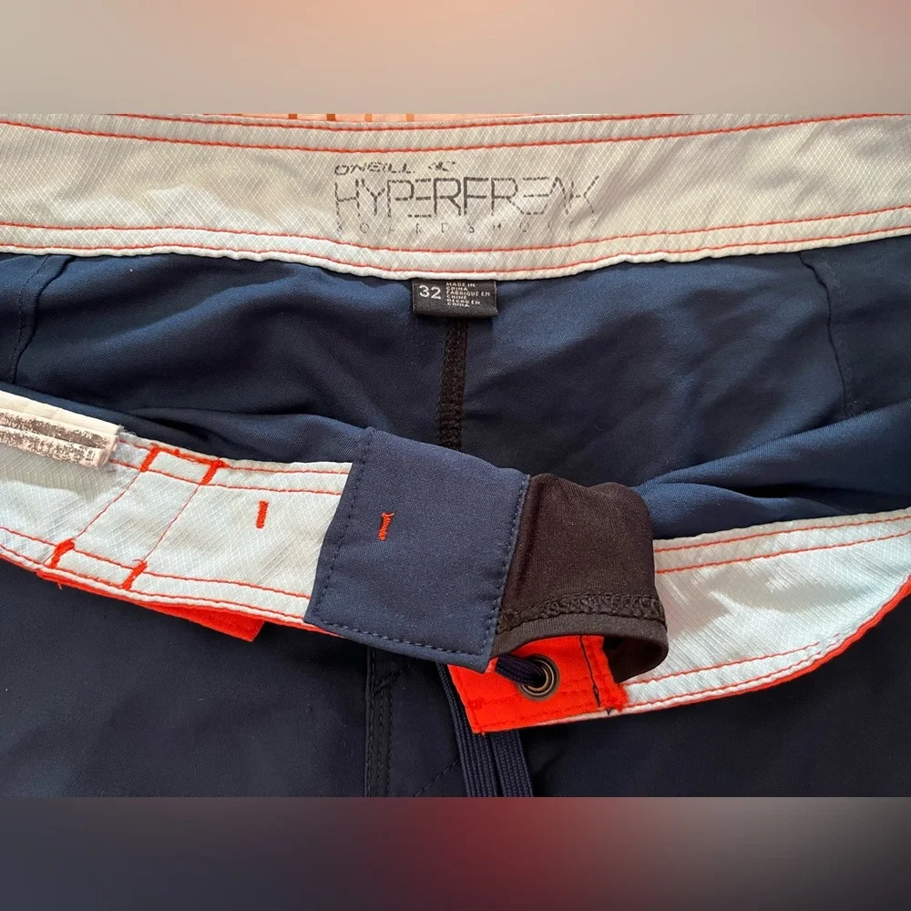Men’s O’Neill Hyperfreak swim shorts, size 32 blue/orange/white summer surf